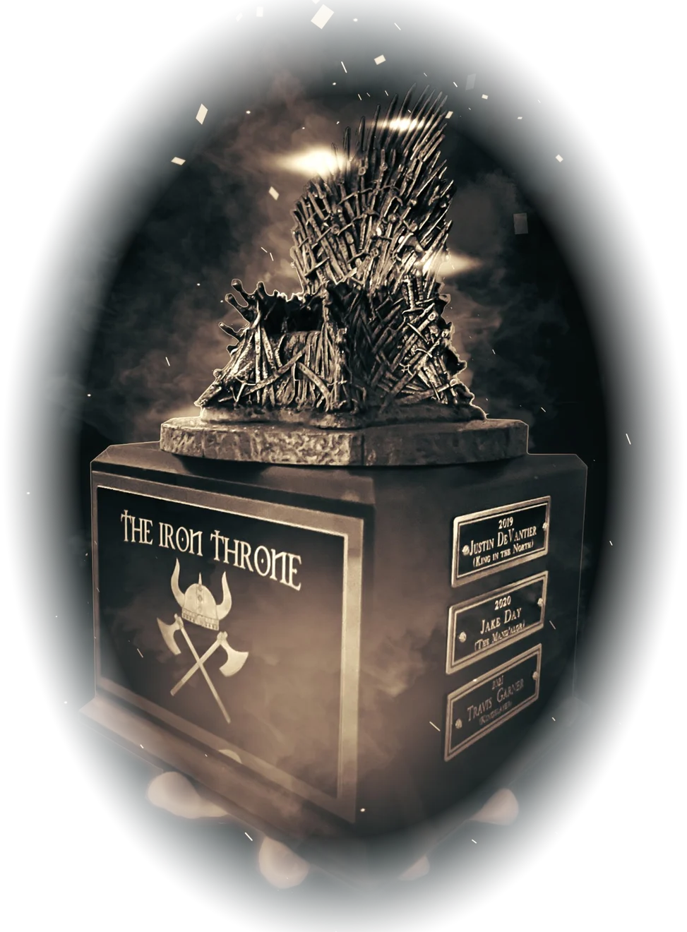 The Iron Throne trophy, lit from above by a beam of light